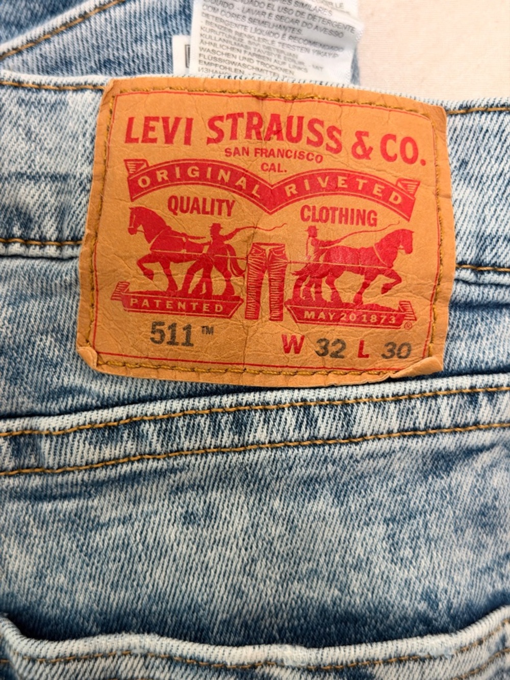 Levi's 511 Slim Men's Jeans in Light Blue Wash with Tan Leather Patch